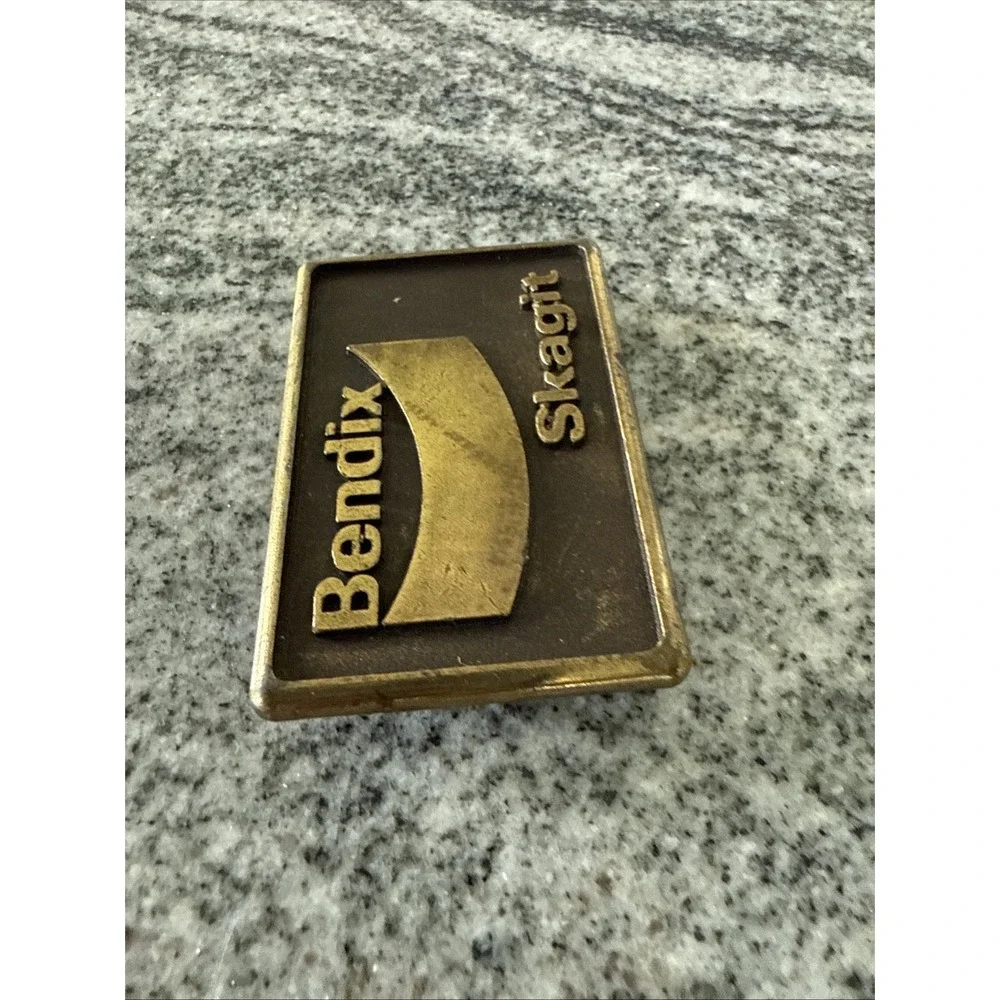 brass belt buckle logos Bendix Corporation and Skagit Car‎ Brake Equipment 1978